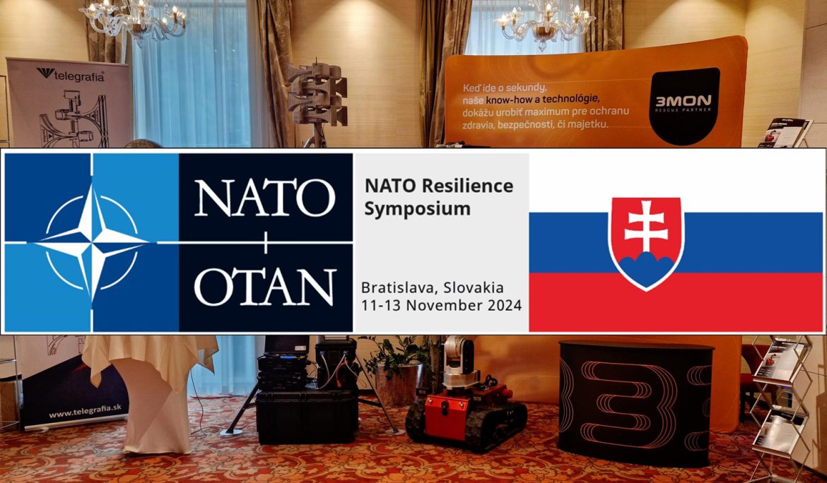 Cover image showing NATO Resilience Symposium 2024 with NATO emblem, Slovak flag and Telegrafia siren solutions displayed at the event in Bratislava.