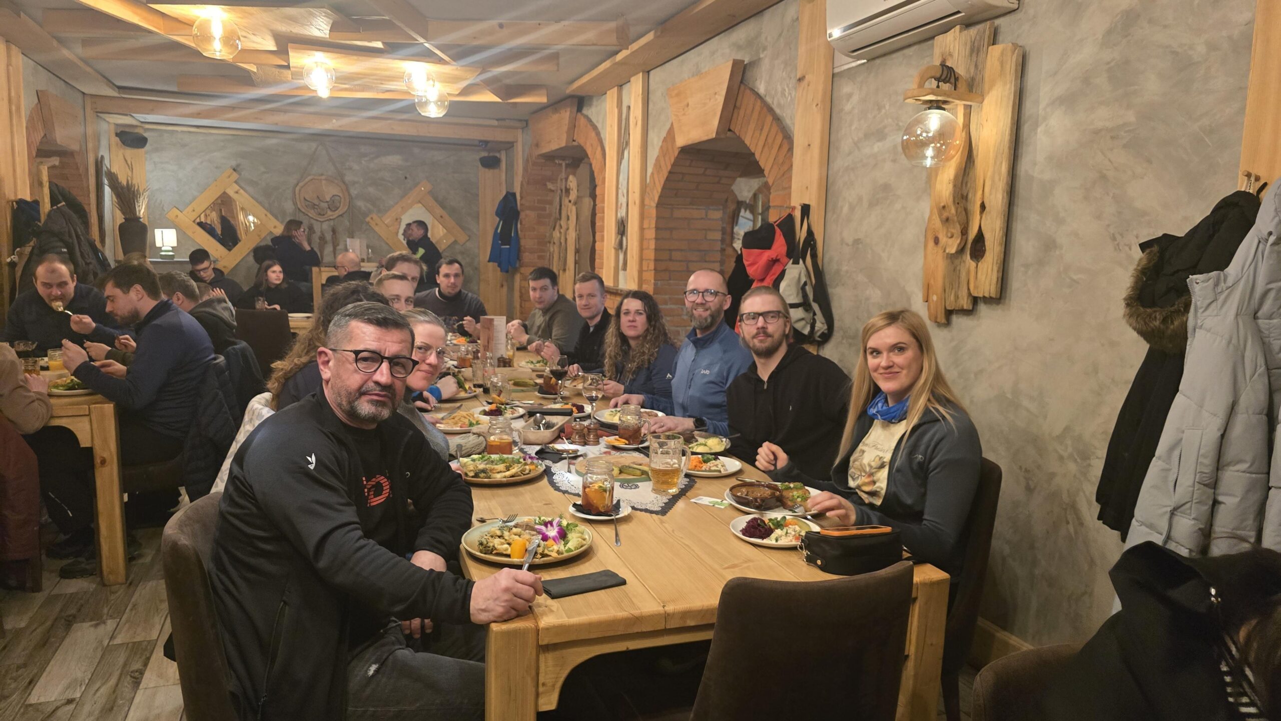 Telegrafia team having lunch at restaurant during teambuilding in Krynica