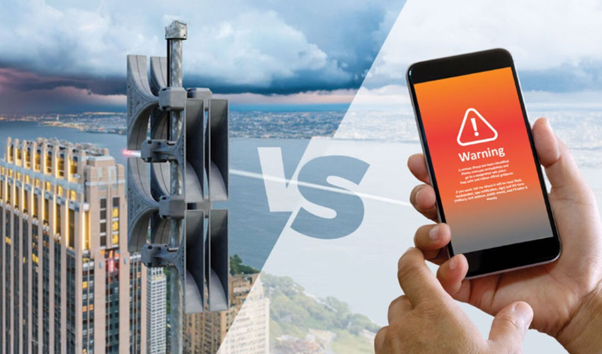 Modern warning systems with mobile alerts compared to outdoor electronic siren in urban environment